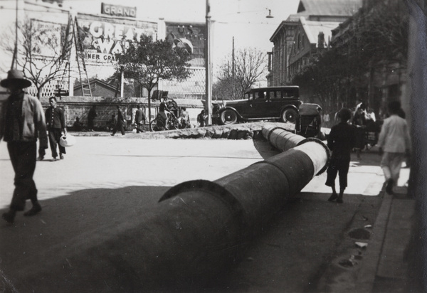 A large pipe in a street, Tianjin floods, 1938