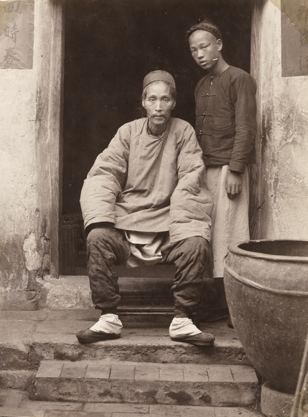 A doctor sitting on the threshold of a house, Yunxiao