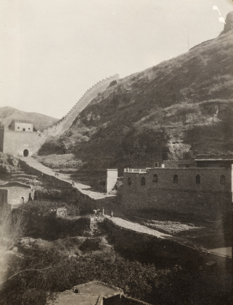 A defensive wall and gateway in a mountainous area