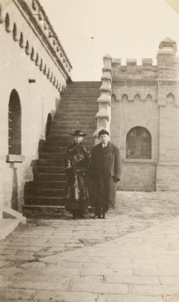 Dr and Mrs John Preston Maxwell by the Legation wall, Beijing