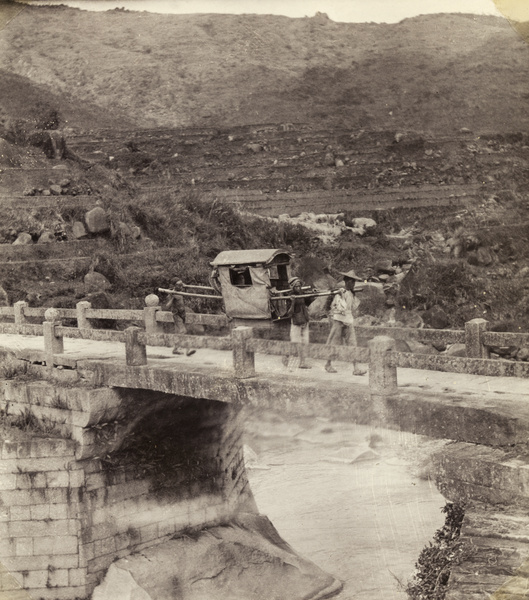 Bearers with a sedan chair crossing a bridge in the Yongchun valley, Fujian