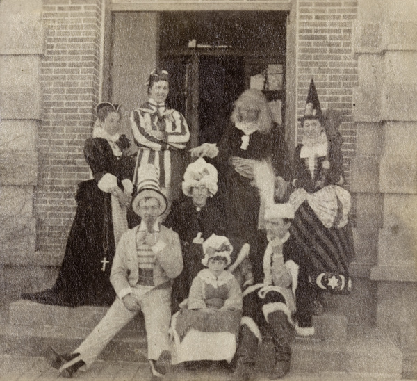 A group of eight in fancy dress costumes, Beijing