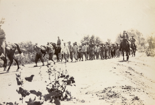American cavalry with 'Boxer' prisoners, Tientsin