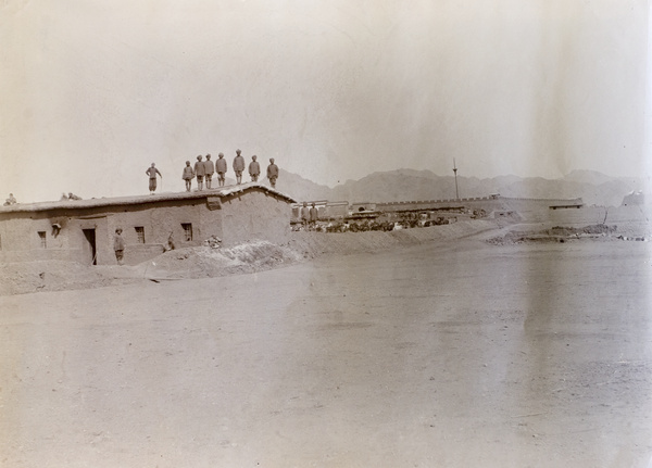 British Indian soldiers on a roof top, near a fort