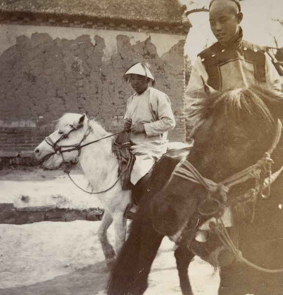 Servants to British officers, on ponies