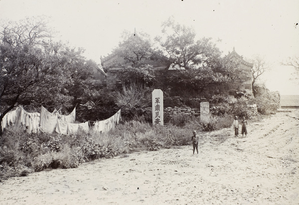 Laundry drying near a temple, Weihaiwei