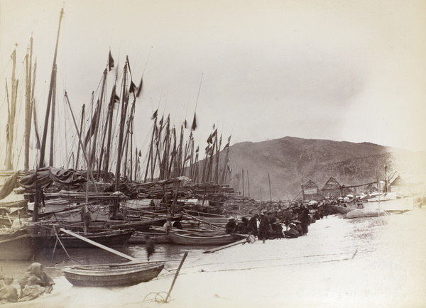 Groups of people beside boats, Deep Bay, Hong Kong