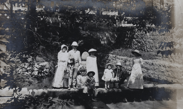 Family day out by pond