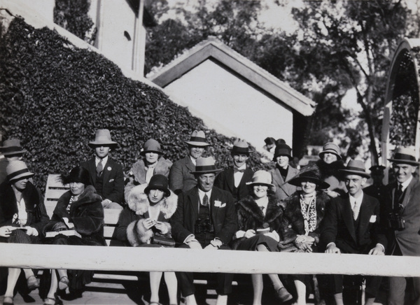 Group in an enclosure at the races