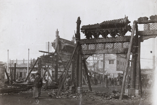 Fire damaged pailou after mutiny, Peking, 1912