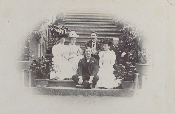 A group siting on steps