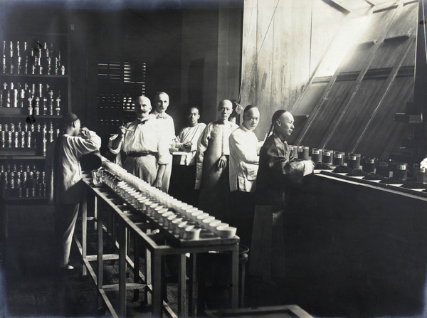 John Charles Oswald in the tea-tasting room at Odell and Co Ltd., Fuzhou