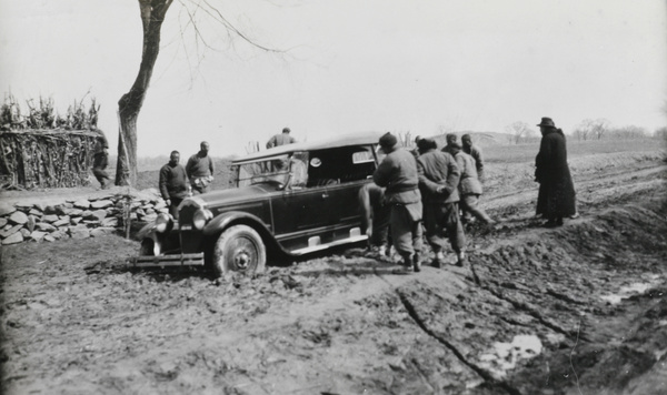 Car stuck in mud, north of Peking