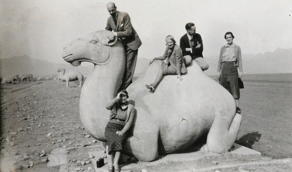 Posing on a stone camel, Spirit Way to the Ming Tombs, near Beijing