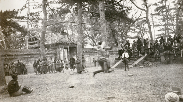 Watching Ann Phipps doing the long jump, ‘after luncheon sports’ at the Tomb of the Princess, Beijing