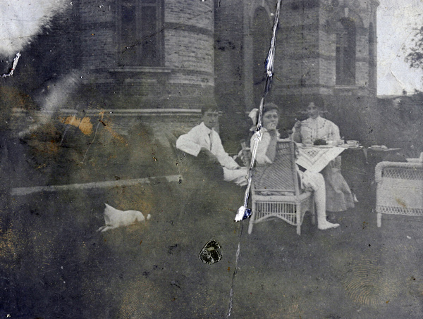 Madeline Pym, Dare Wallace and Claude Wallace having tea in a garden, Shanghai