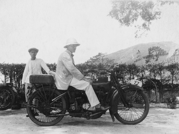 Frank Alexander Davidson on a motorbike, Hong Kong