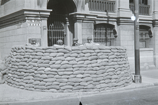Sandbagged redoubt and soldiers outside Bank of Communications, 14 The Bund, Shanghai