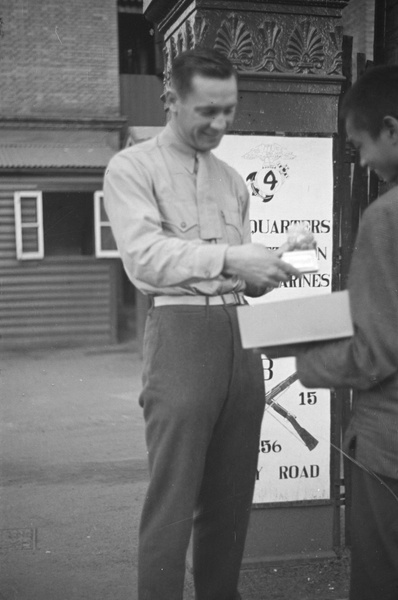 Chinese street seller and American Marine