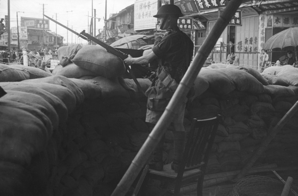 Soldier on duty at road junction guard post