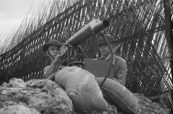 China Marines setting up a Browning heavy machine gun