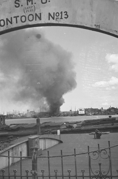 A fire in Pudong, Shanghai, viewed from the Nanking Road Pontoon