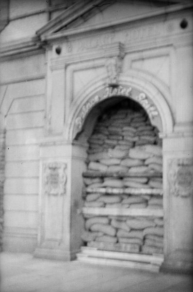 Sandbags fill entrance to the Palace Hotel Grill, Shanghai