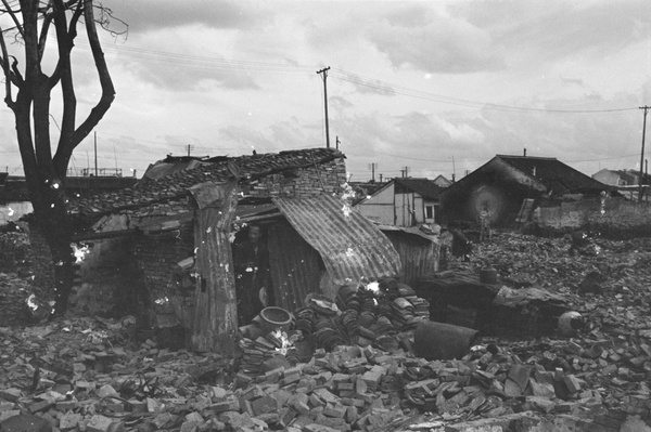 Makeshift shelter and reclaimed roof tiles, Shanghai