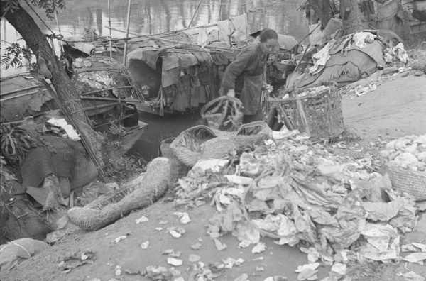 Rag picker and boats, Shanghai