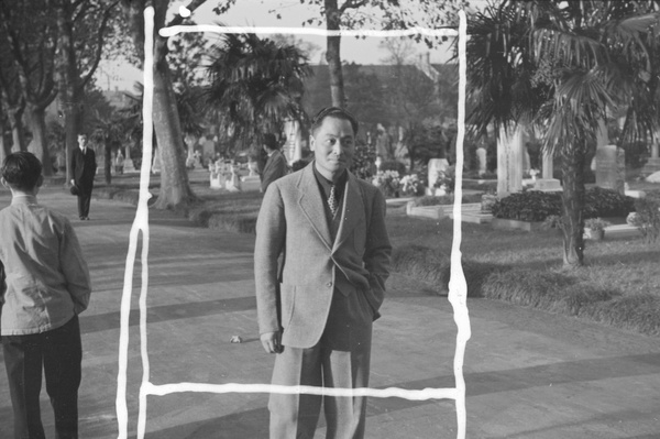 Photojournalist H. S. 'Newsreel' Wong at Bubbling Well Road Cemetery, Shanghai