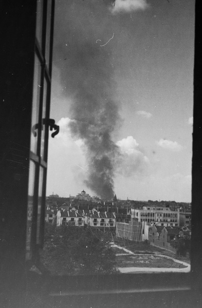 Smoke rising beyond Park Ravinel, Shanghai