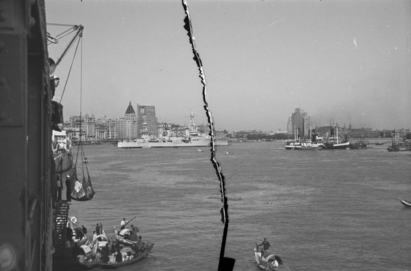 Sampans and U.S.S. Chaumont, loading or unloading, Shanghai