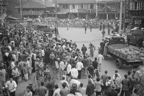 Crowd and barricades at a street junction, French Concession, Shanghai