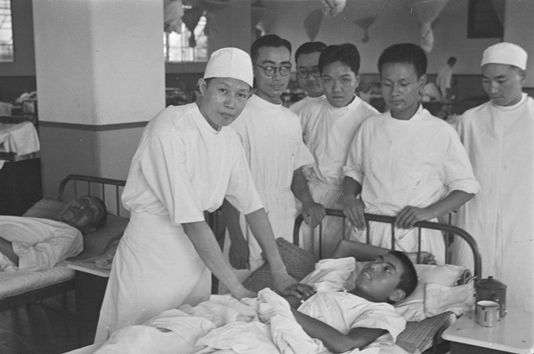 Doctors with patients in a hospital ward, Shanghai