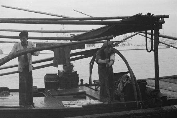 Bargees at work on the Whangpoo River, Shanghai