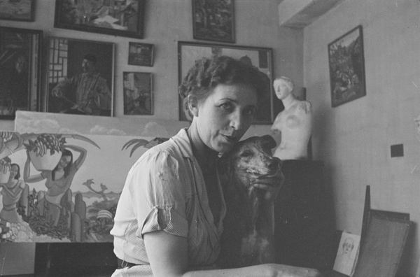 A woman with a dachshund in the studio of Victor Podgoursky, Shanghai