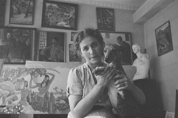 A woman with a dachshund in the studio of Victor Podgoursky, Shanghai