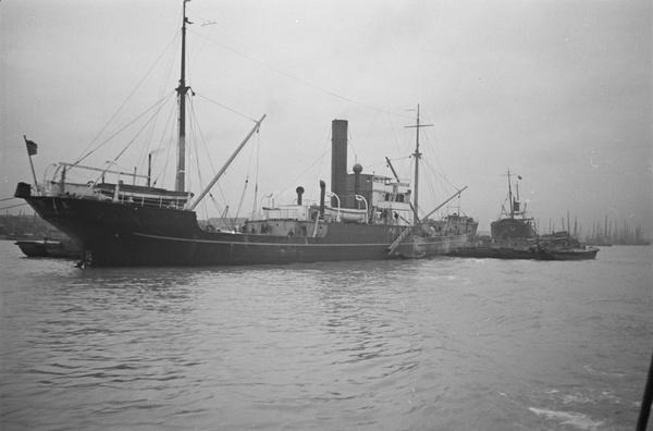 Freighter with lighters, Shanghai