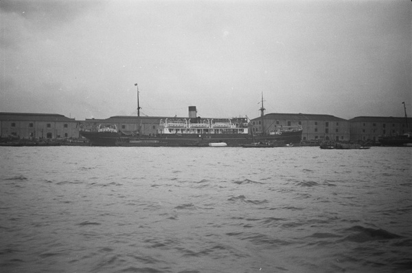 A China Merchants S.N. Co. passenger steamer and warehouses, Shanghai