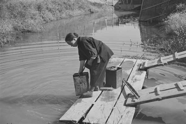 Collecting water from a creek, Shanghai