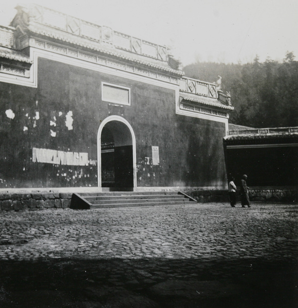 Entrance, with posters on the wall