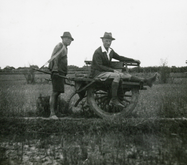 Colonel Ruxton travelling by wheelbarrow