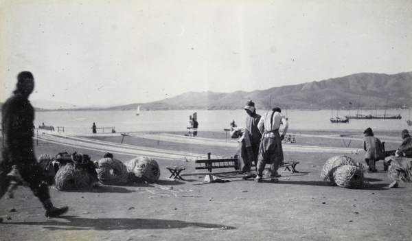 Rope making on a beach