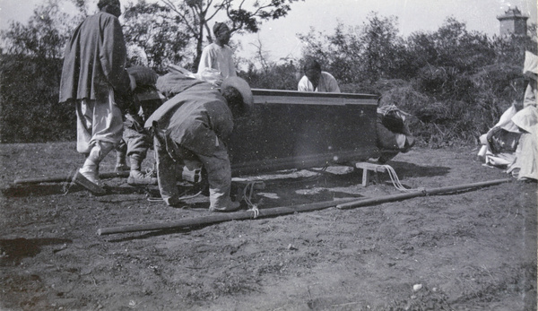 Coffin with bearers