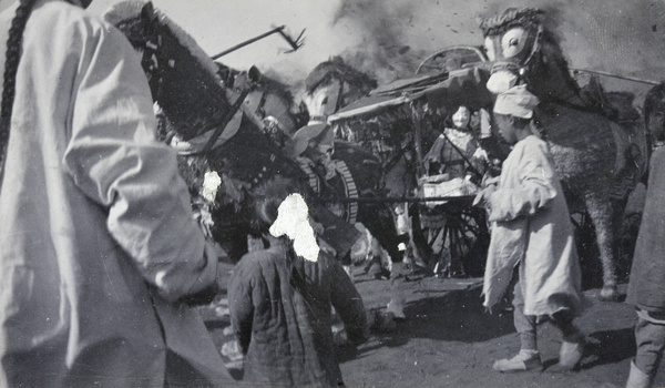 Burning paper offerings at a funeral