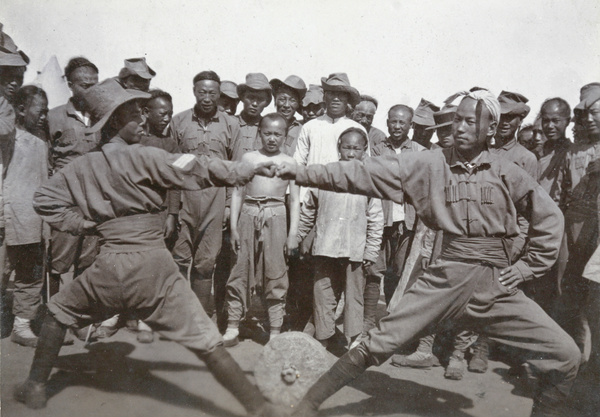 Trial of strength display by soldiers of the 1st Chinese Regiment
