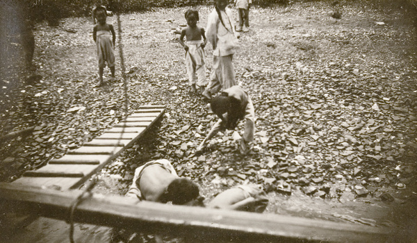 Children on riverbank