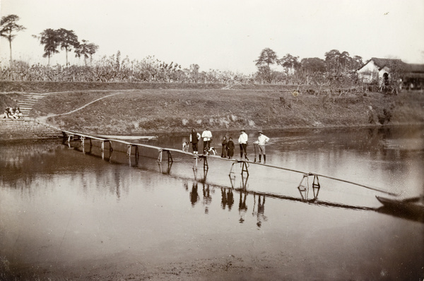 Shooting party on wooden footbridge