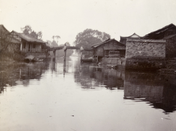 Bridge over creek, and houses