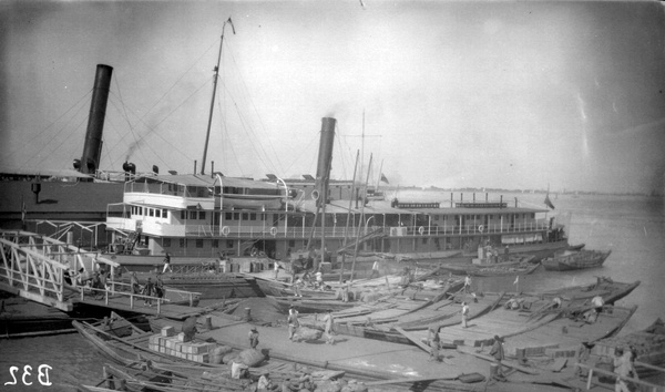 Loading goods at Butterfield and Swire hulks in Hankow